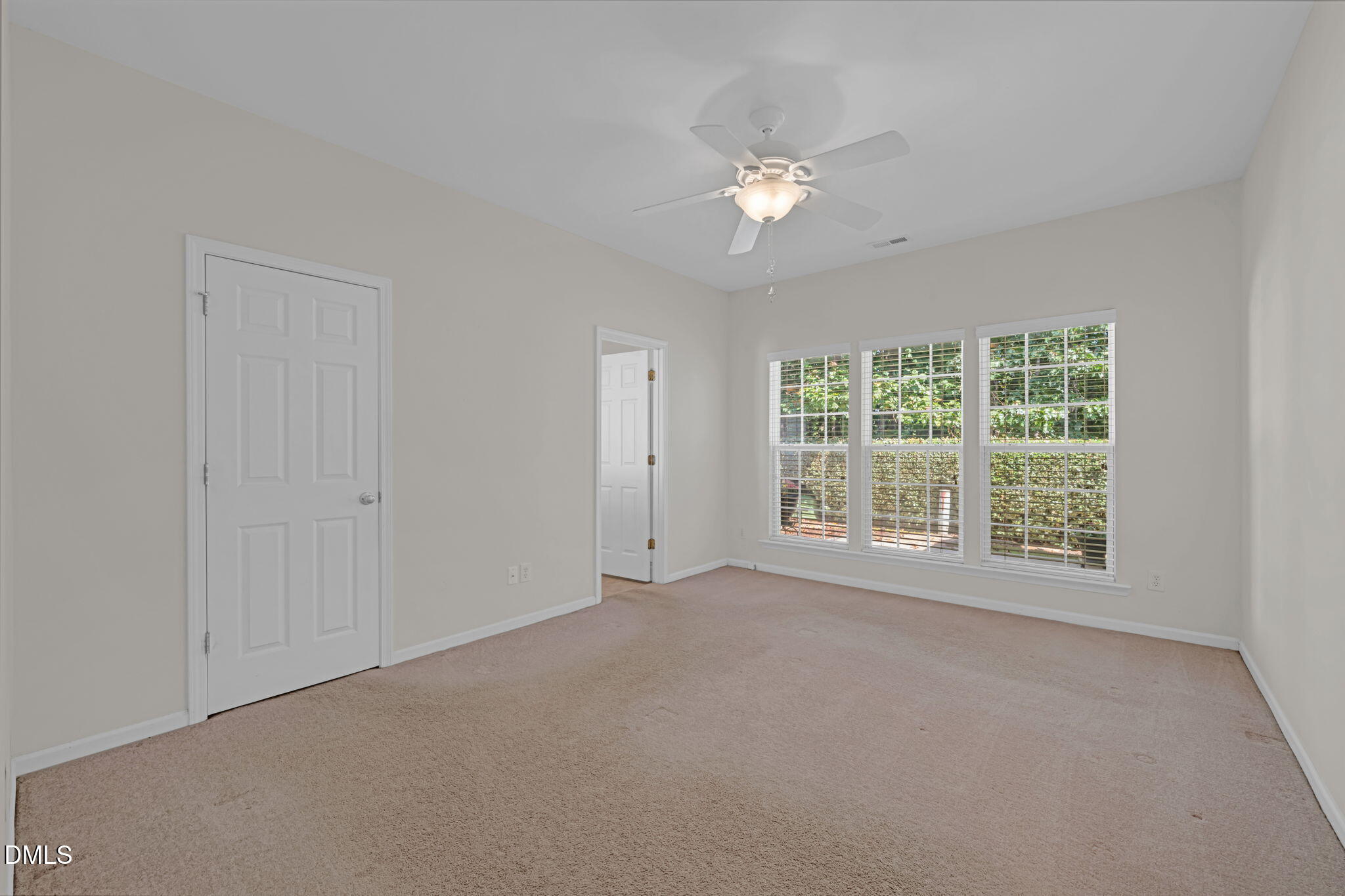 12014 Fox Valley Street Raleigh, NC 27614 - Photo 15 of 42 a view of an empty room with a window