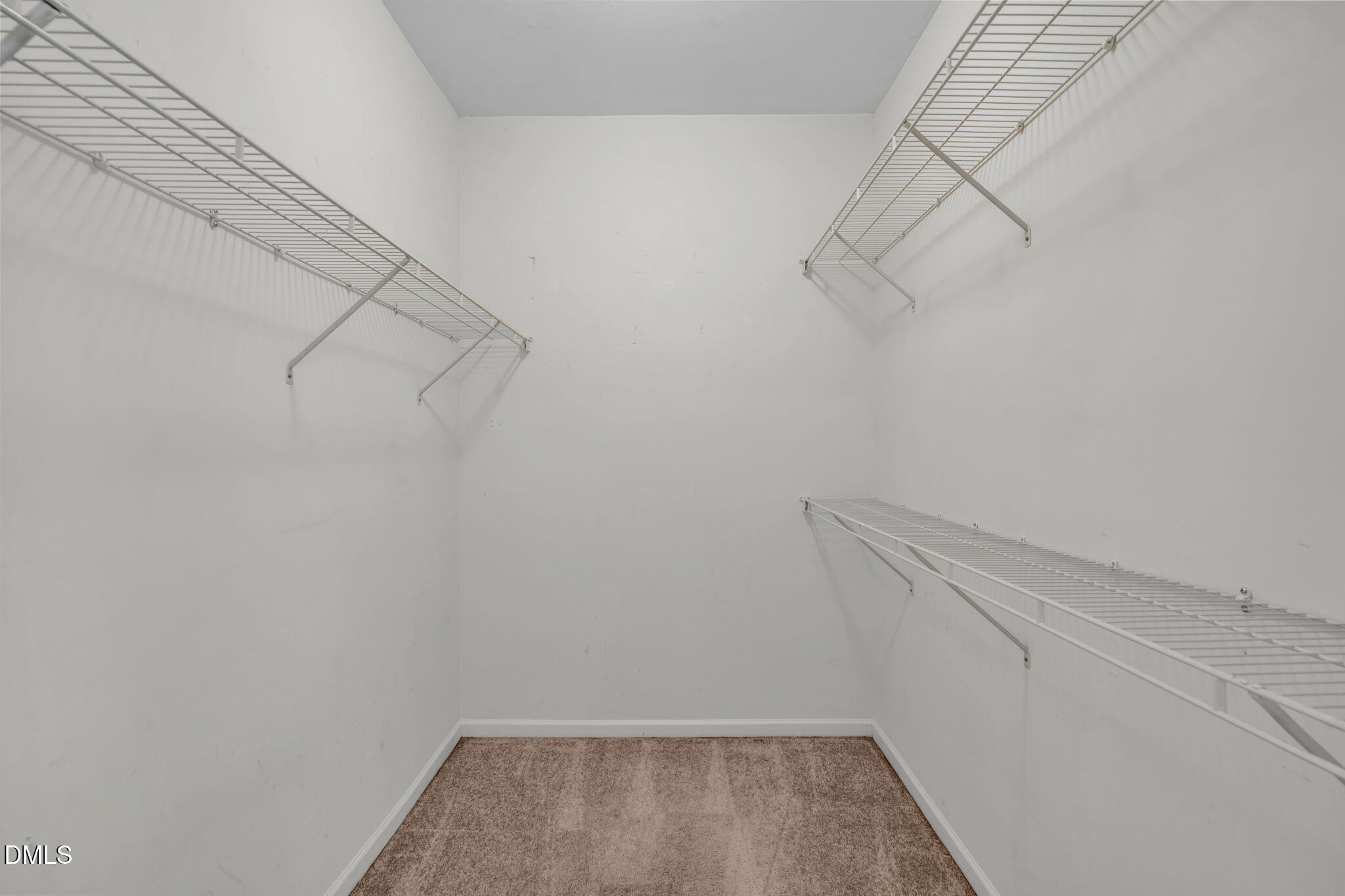 12014 Fox Valley Street Raleigh, NC 27614 - Photo 19 of 42 a view of a room with racks on the wall