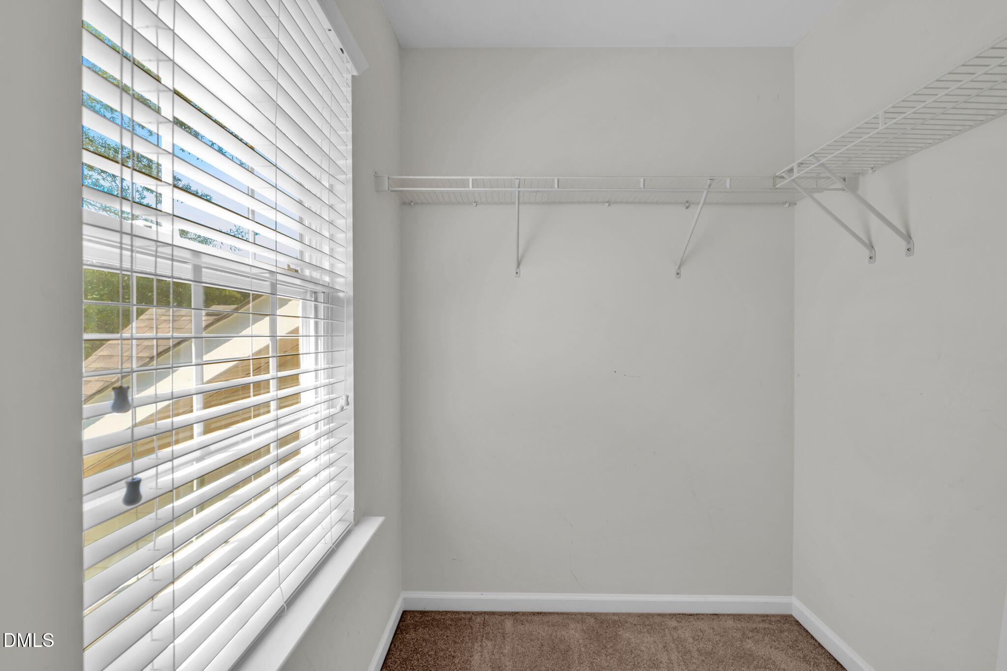12014 Fox Valley Street Raleigh, NC 27614 - Photo 31 of 42 a view of a small space with wooden floor and a window