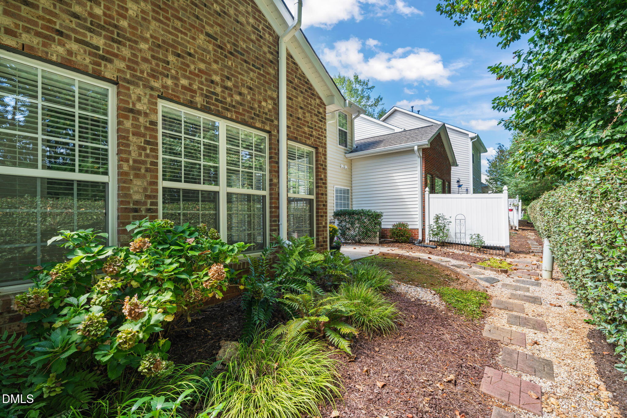 12014 Fox Valley Street Raleigh, NC 27614 - Photo 35 of 42 a house with a garden view