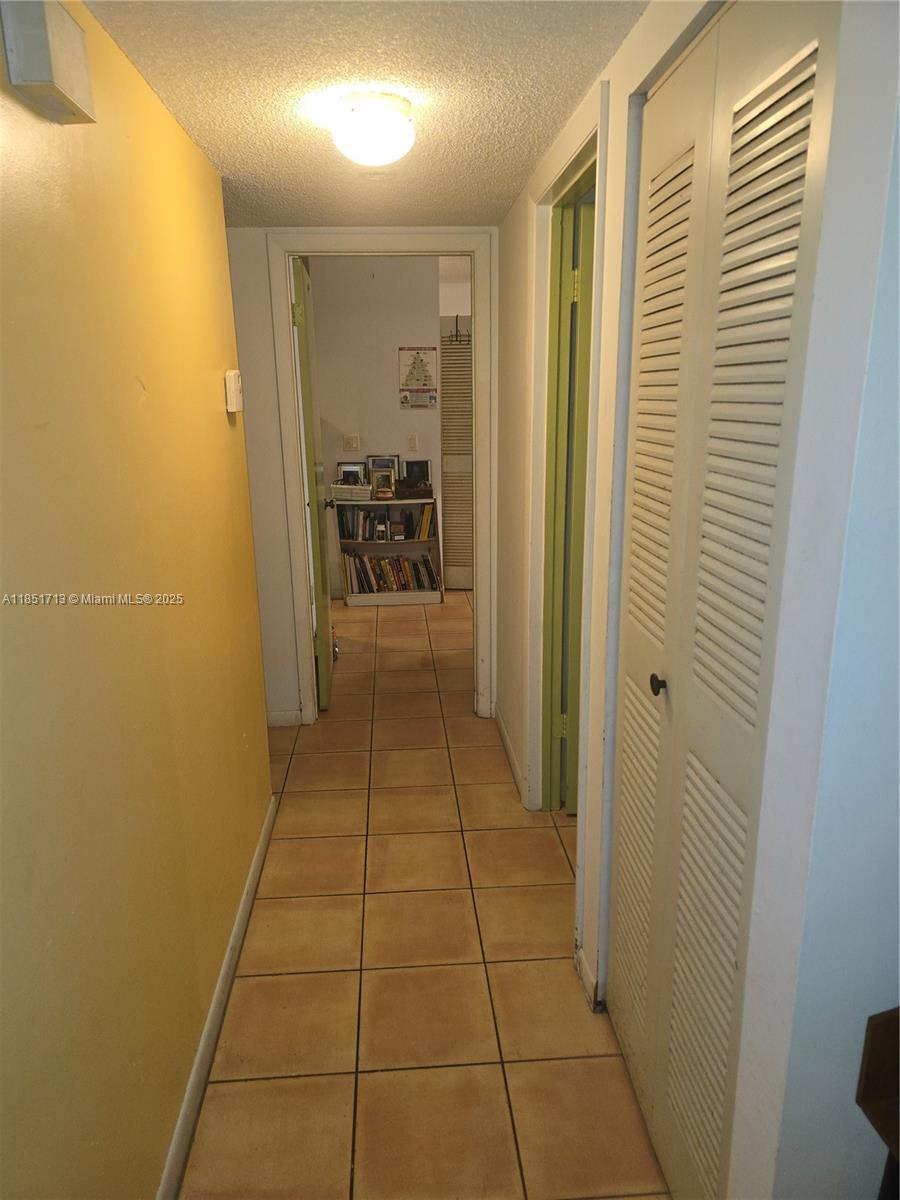 21121 Southwest 85th Avenue, Unit 105 Cutler Bay, FL 33189 - Photo 11 of 13 a bathroom with a sink