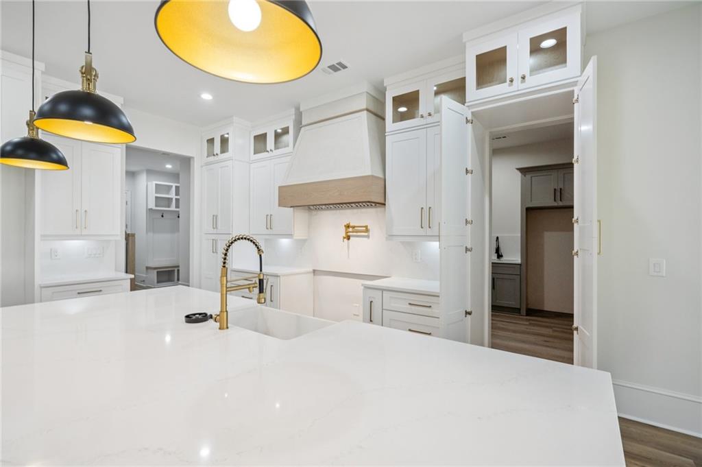 4546 Fawn Path Gainesville, GA 30506 - Photo 23 of 64 a kitchen with stainless steel appliances a stove a sink and a refrigerator