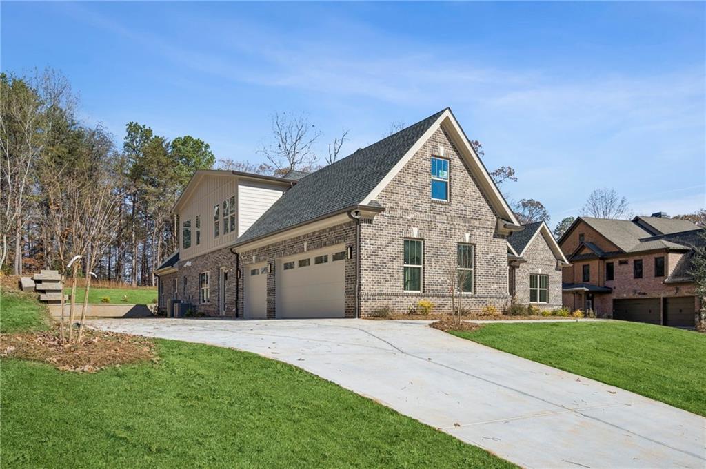 4546 Fawn Path Gainesville, GA 30506 - Photo 3 of 64 a front view of house with yard and green space