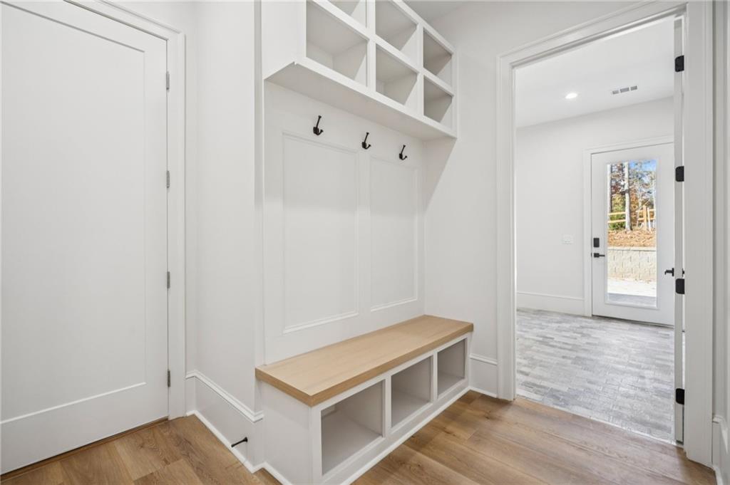4546 Fawn Path Gainesville, GA 30506 - Photo 40 of 64 a view of an empty room with wooden floor