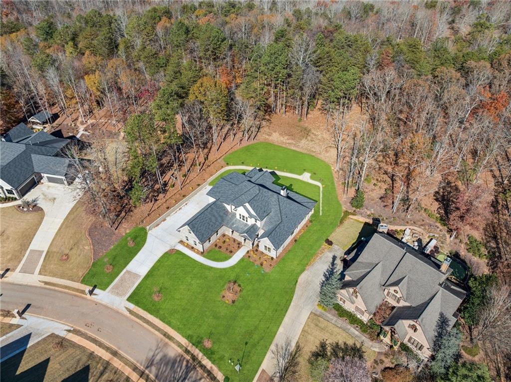 4546 Fawn Path Gainesville, GA 30506 - Photo 5 of 64 an aerial view of a tennis ground and trees all around