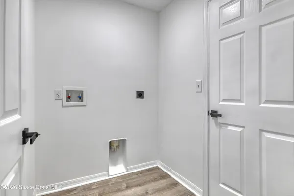 a view of a hallway with closet