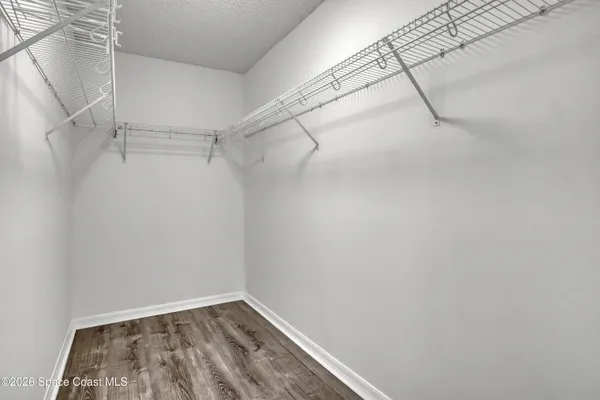 a view of a room with racks on the wall