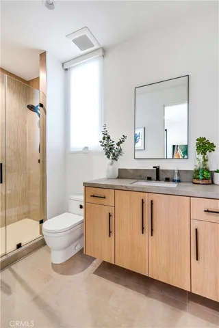 a large white kitchen with lots of counter space