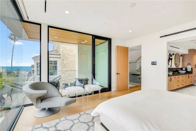 a spacious bathroom with a double vanity sink and a mirror
