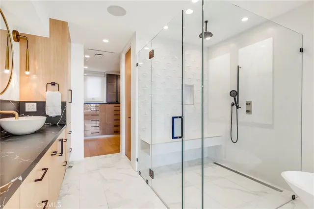 a view of a kitchen with sink washer and dryer