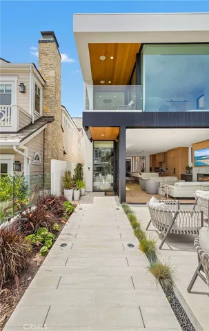 a view of a patio with couches and potted plants
