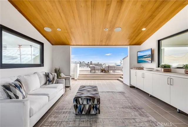 a outdoor living space with furniture and city view