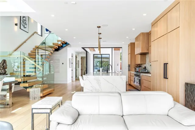a living room with furniture and a table