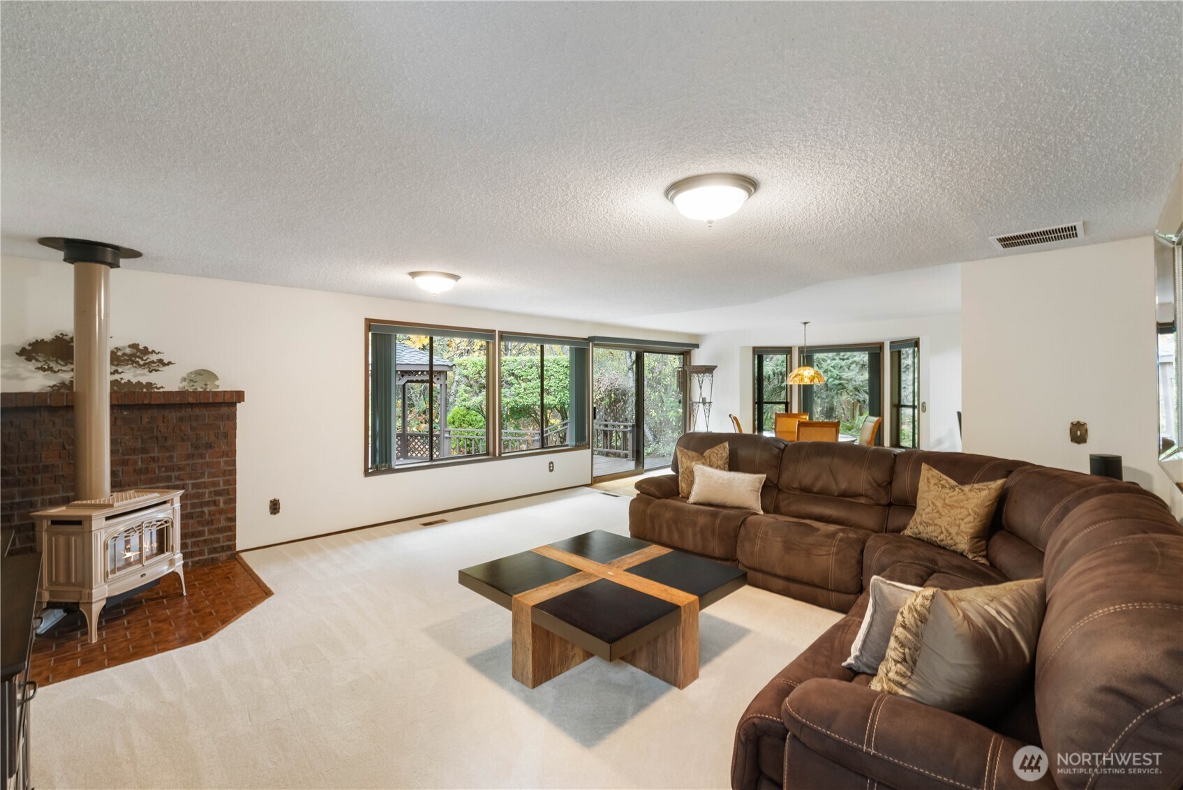 36607 9th Avenue Southwest Federal Way, WA 98023 - Photo 19 of 40 a living room with furniture and a flat screen tv