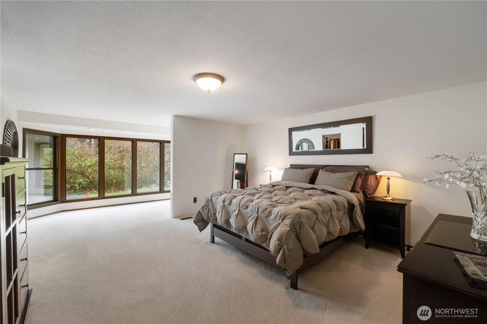 36607 9th Avenue Southwest Federal Way, WA 98023 - Photo 21 of 40 a spacious bedroom with a bed couch and a large window