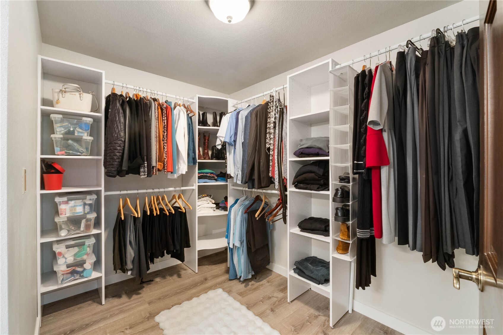 36607 9th Avenue Southwest Federal Way, WA 98023 - Photo 23 of 40 a view of walk in closet with clothes and shoes