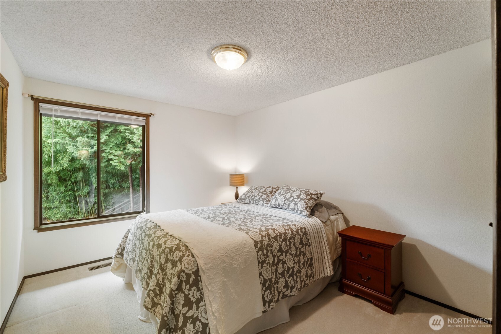 36607 9th Avenue Southwest Federal Way, WA 98023 - Photo 24 of 40 a bedroom with a bed and a window