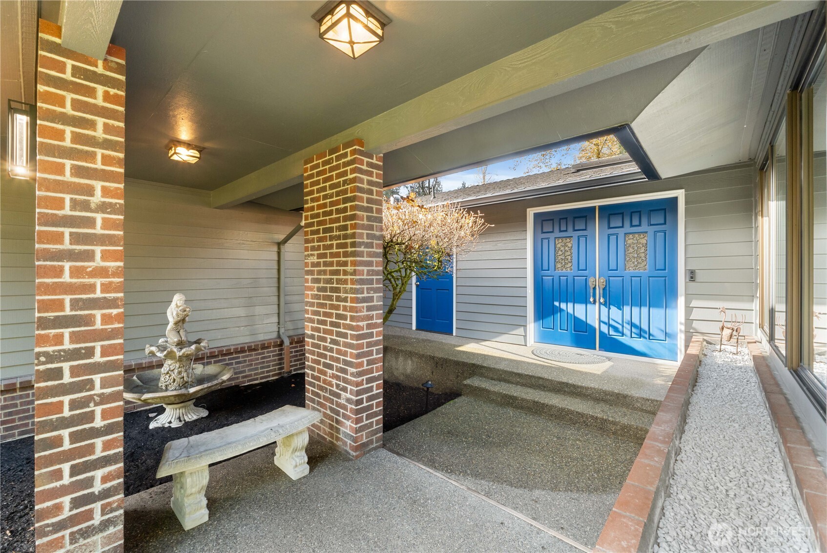 36607 9th Avenue Southwest Federal Way, WA 98023 - Photo 4 of 40 a view of a porch with a bench in front of house