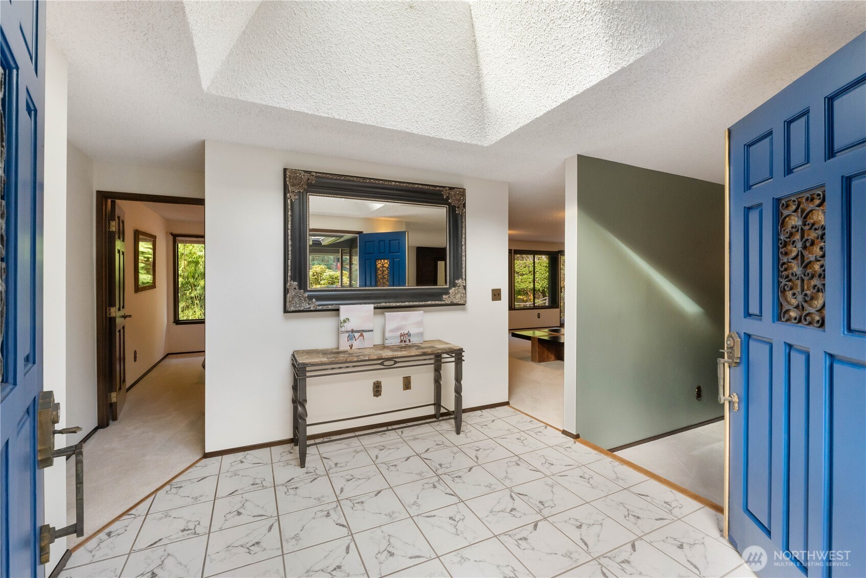 36607 9th Avenue Southwest Federal Way, WA 98023 - Photo 7 of 40 a view of a hallway with bathroom and mirror