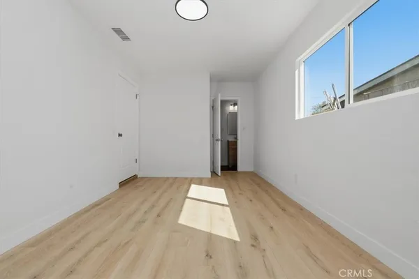 a view of an empty room and window