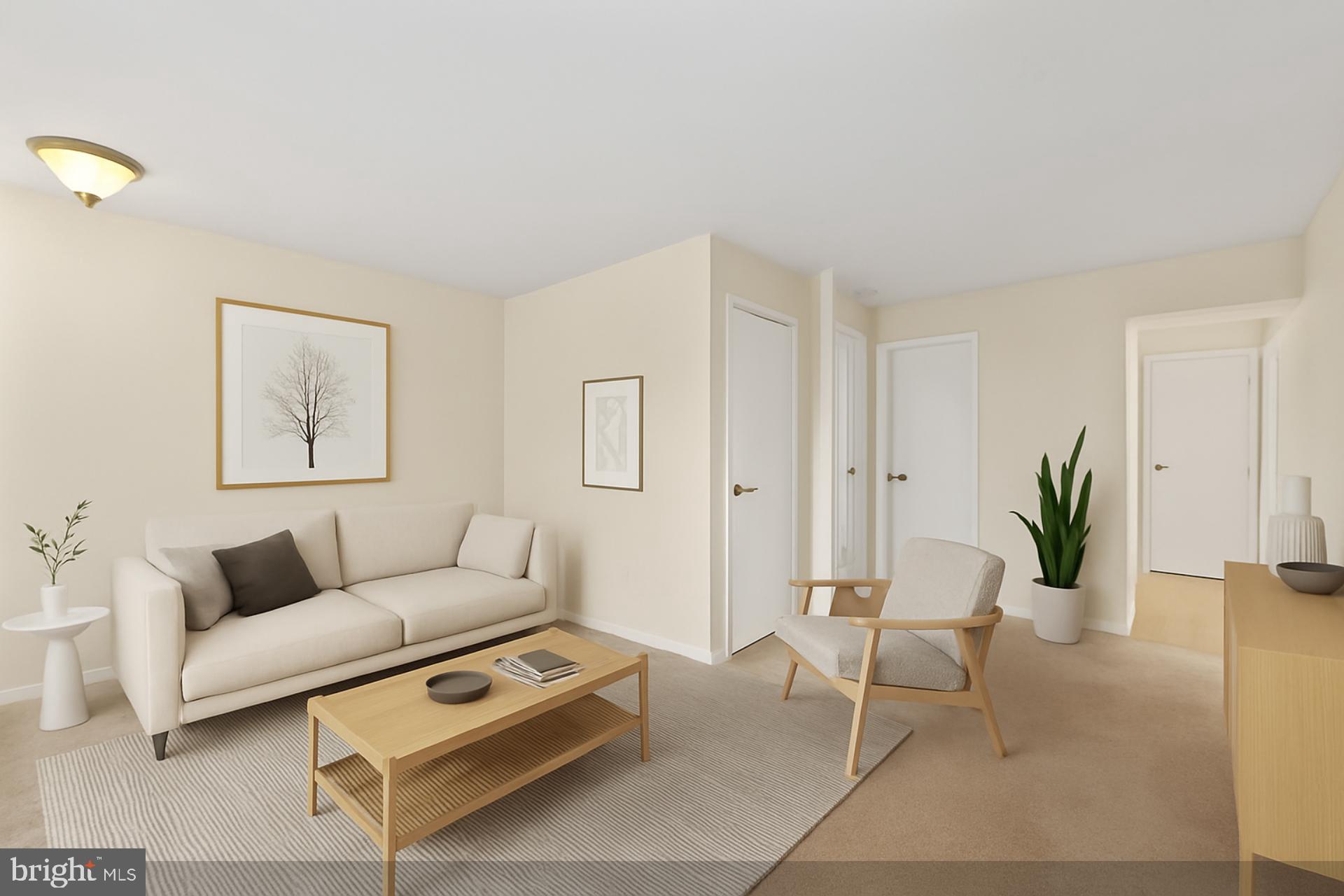 15372 Gunsmith Terrace Woodbridge, VA 22191 - Photo 21 of 37 a living room with furniture and a potted plant