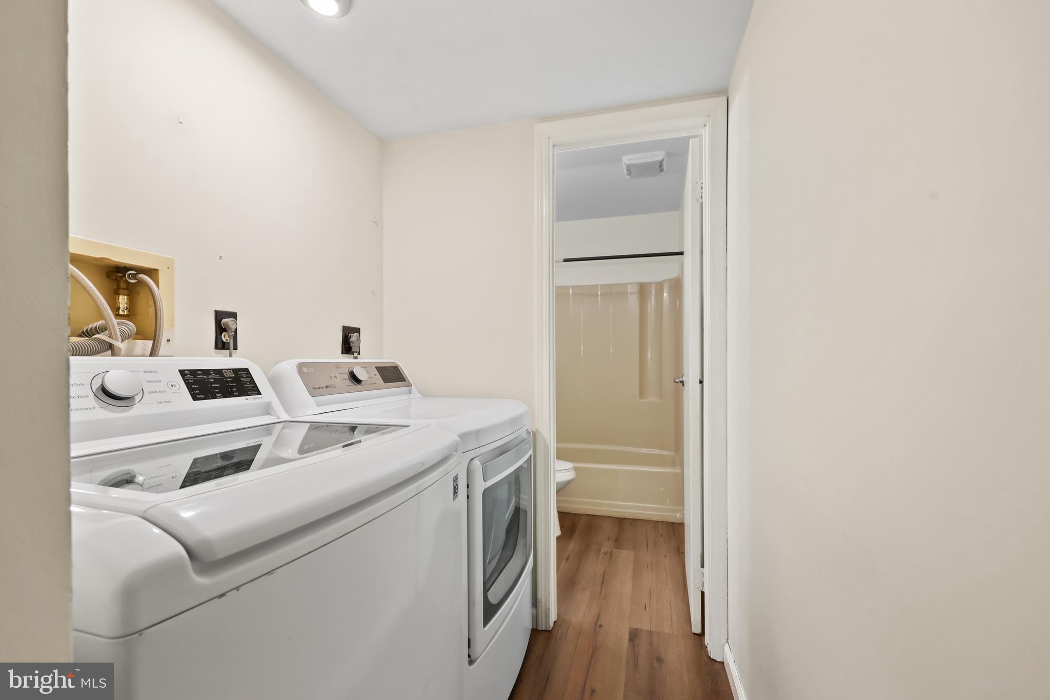 15372 Gunsmith Terrace Woodbridge, VA 22191 - Photo 25 of 37 a utility room with dryer and washer