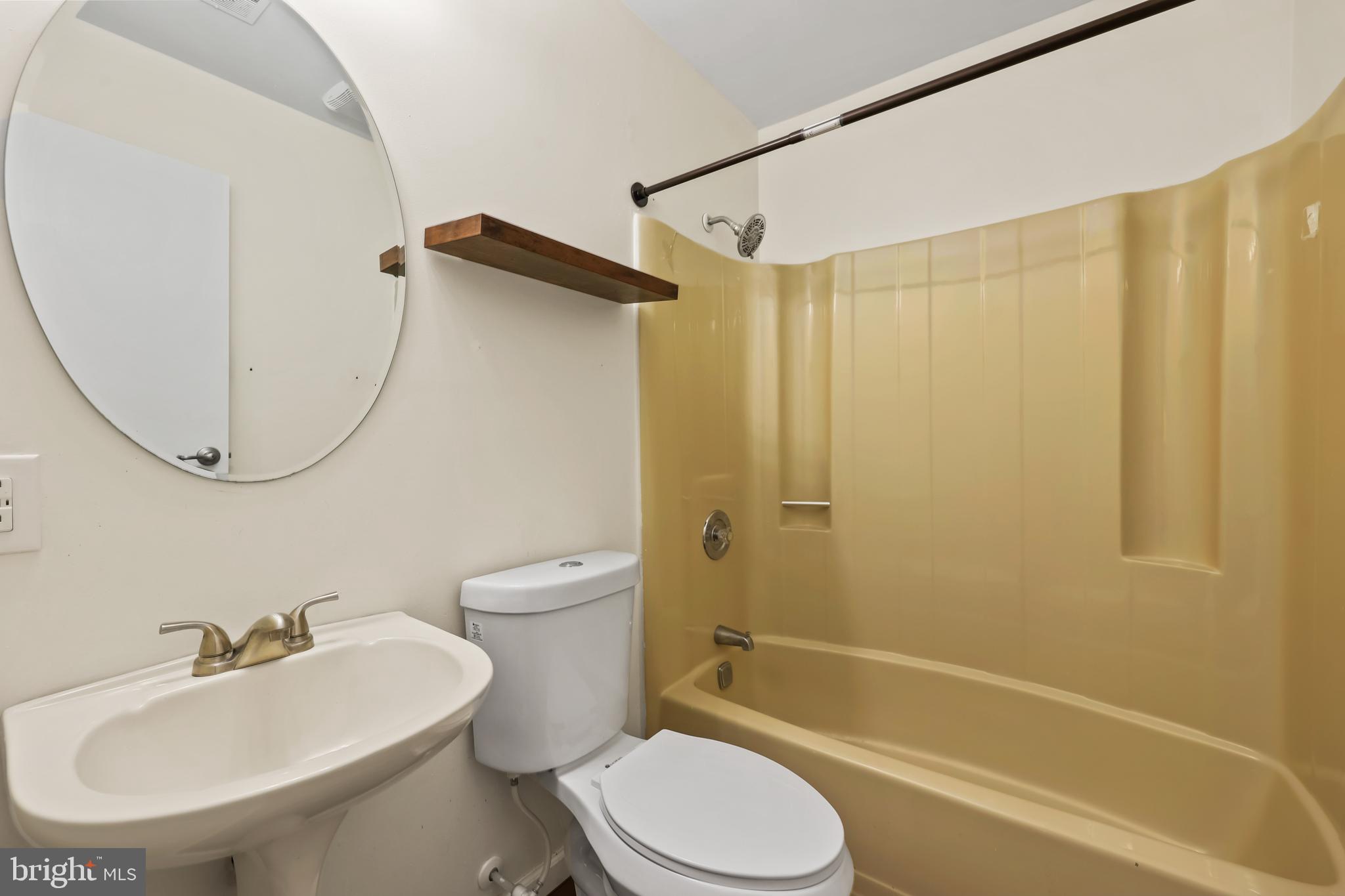 15372 Gunsmith Terrace Woodbridge, VA 22191 - Photo 26 of 37 a bathroom with a sink toilet and shower