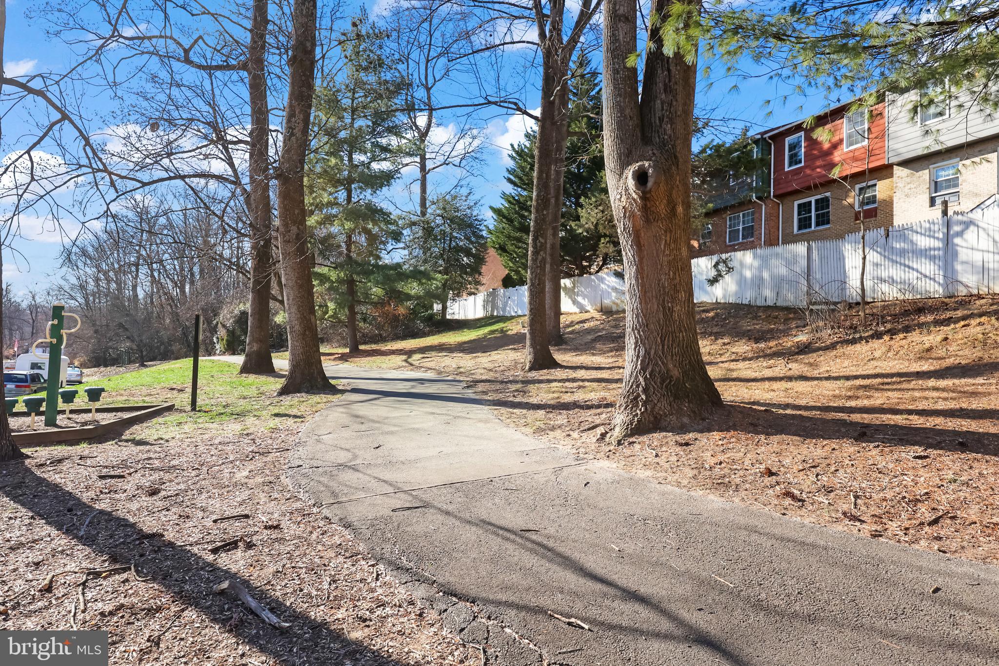 15372 Gunsmith Terrace Woodbridge, VA 22191 - Photo 31 of 37 a view of a backyard with wooden fence
