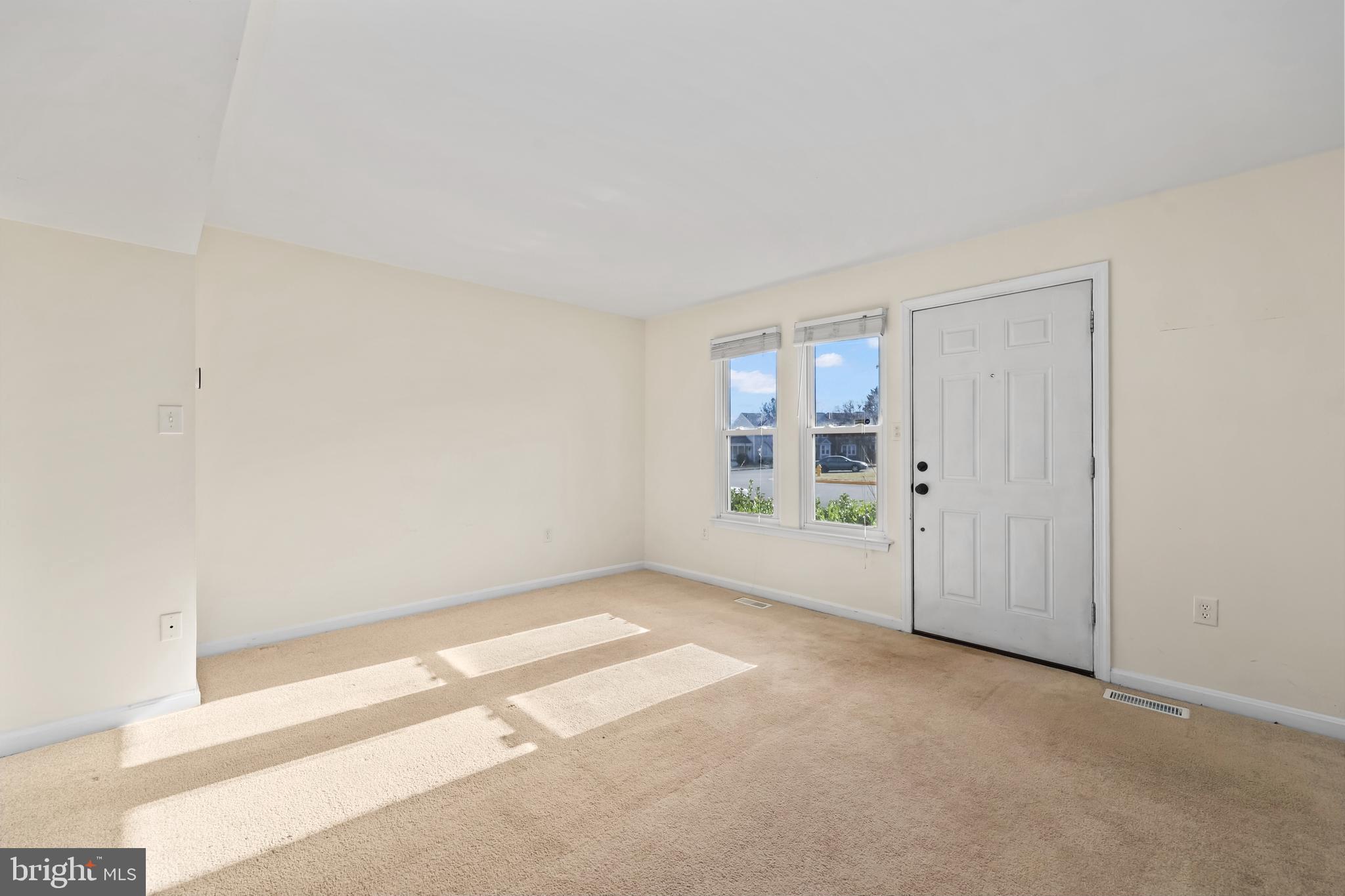 15372 Gunsmith Terrace Woodbridge, VA 22191 - Photo 4 of 37 an empty room with windows