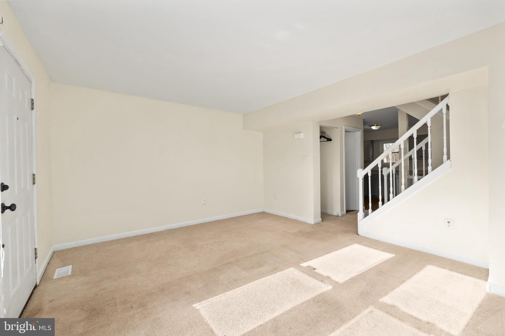 15372 Gunsmith Terrace Woodbridge, VA 22191 - Photo 5 of 37 a view of an empty room with stairs