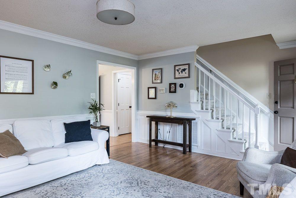 1590 Ranch Road Clayton, NC 27520 - Photo 12 of 26 a living room with furniture and a wooden floor