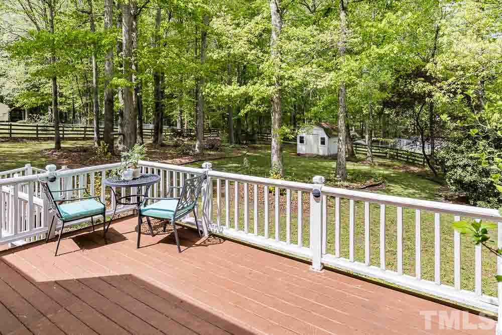 1590 Ranch Road Clayton, NC 27520 - Photo 23 of 26 a view of a chairs and table on the wooden floor