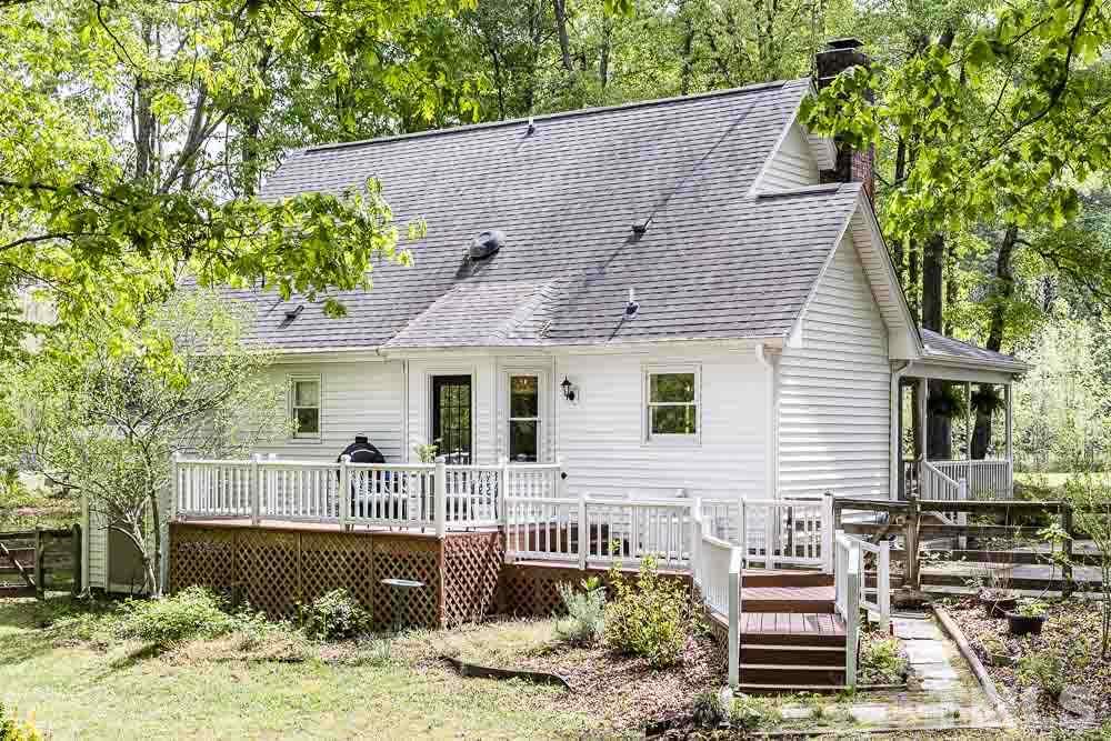 1590 Ranch Road Clayton, NC 27520 - Photo 24 of 26 a front view of a house with garden