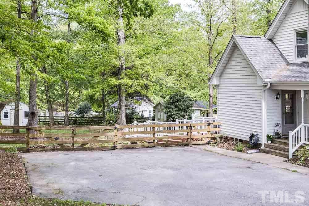 1590 Ranch Road Clayton, NC 27520 - Photo 6 of 26 a view of backyard of house