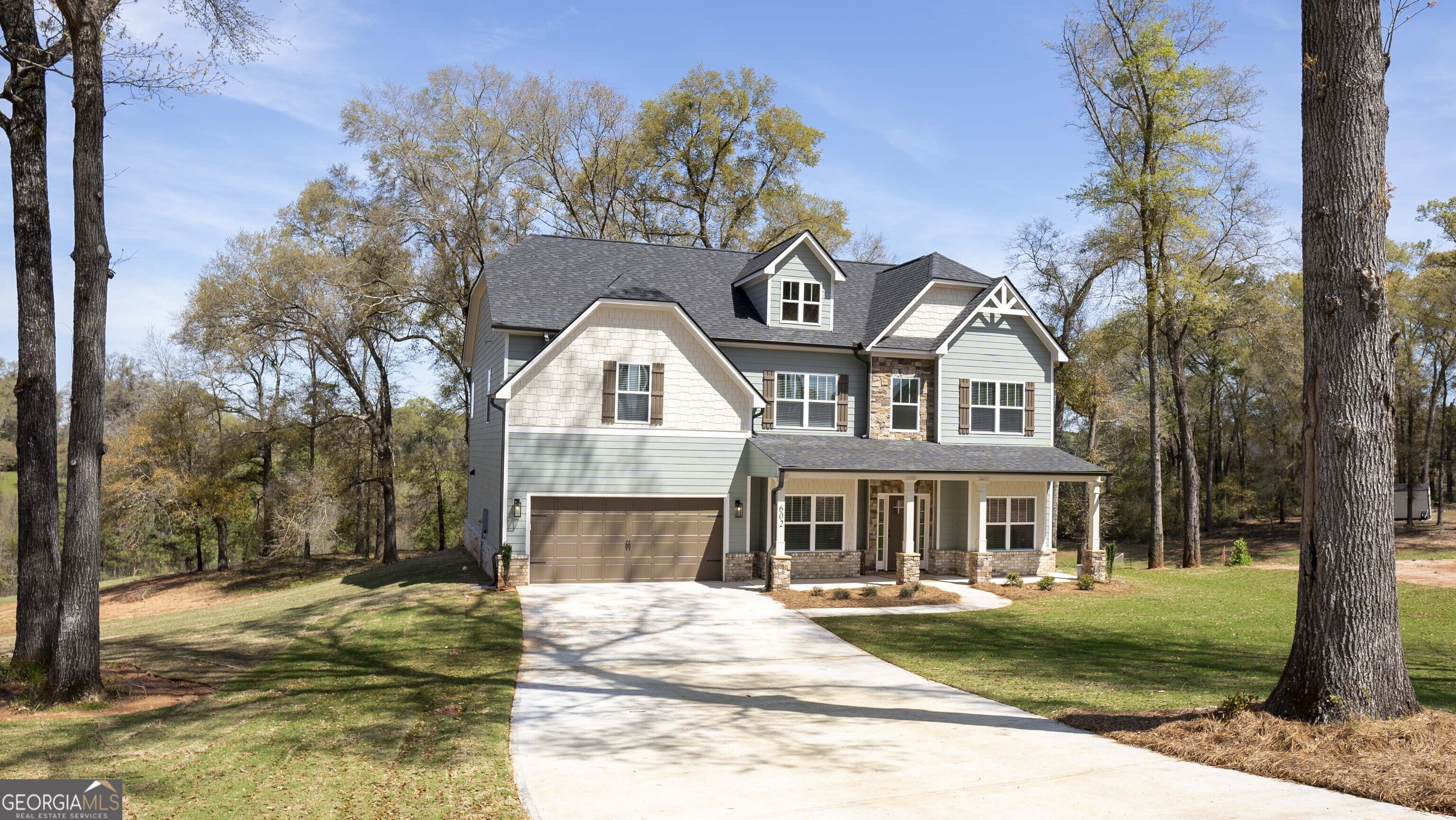 604 Beaver Court Perry, GA 31069 - Photo 2 of 40 a front view of a house with a yard
