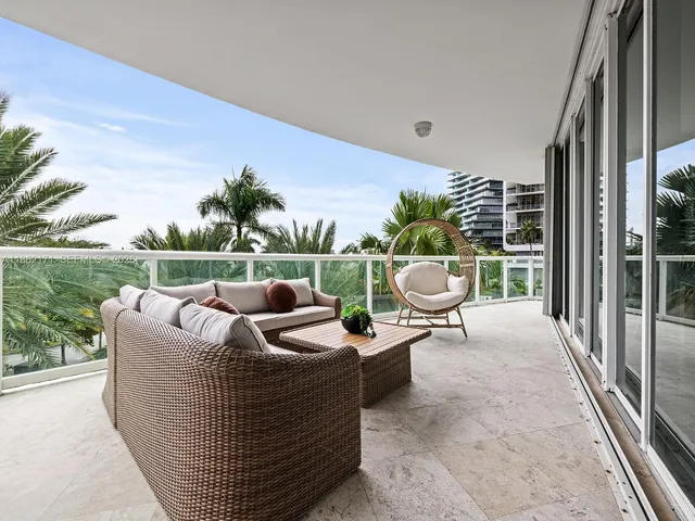 a view of a patio in the backyard