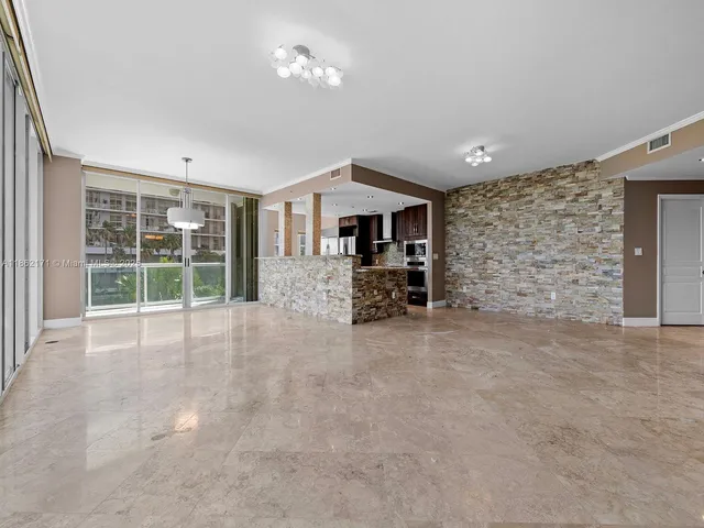 a view of livingroom with furniture and windows