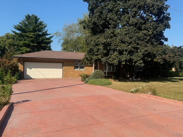 1518 Sharon Road Streator, IL 61364 - Photo 1 of 37 a yellow house with trees in front of it
