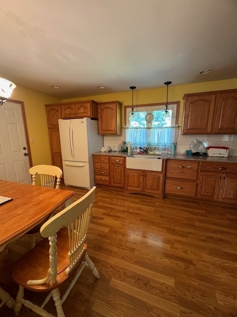 1518 Sharon Road Streator, IL 61364 - Photo 11 of 37 a kitchen with stainless steel appliances granite countertop a stove a sink and a refrigerator