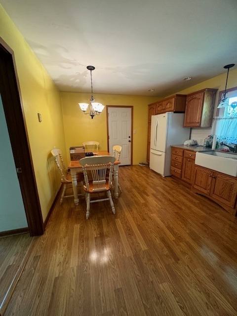 1518 Sharon Road Streator, IL 61364 - Photo 12 of 37 a dining room with furniture and wooden floor