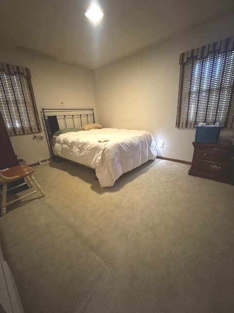 1518 Sharon Road Streator, IL 61364 - Photo 16 of 37 a bedroom with a bed and window