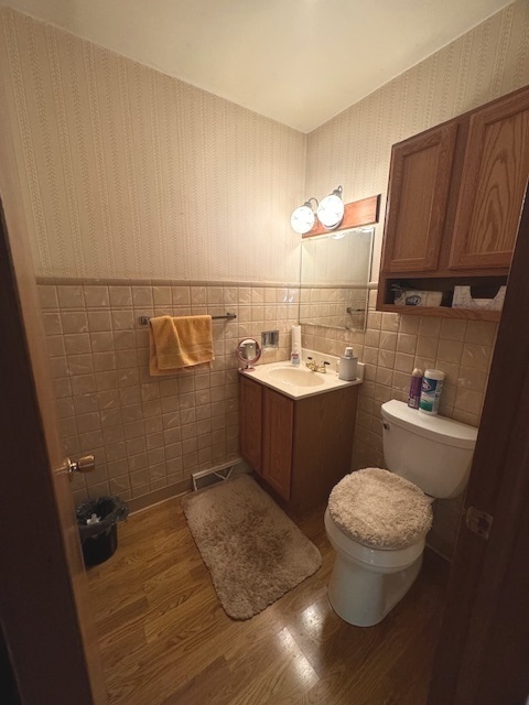 1518 Sharon Road Streator, IL 61364 - Photo 18 of 37 a bathroom with a sink a toilet and a mirror