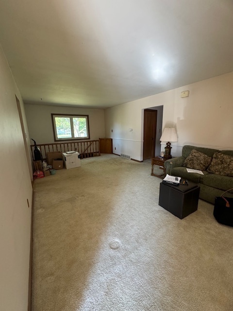 1518 Sharon Road Streator, IL 61364 - Photo 5 of 37 a living room with furniture and a flat screen tv