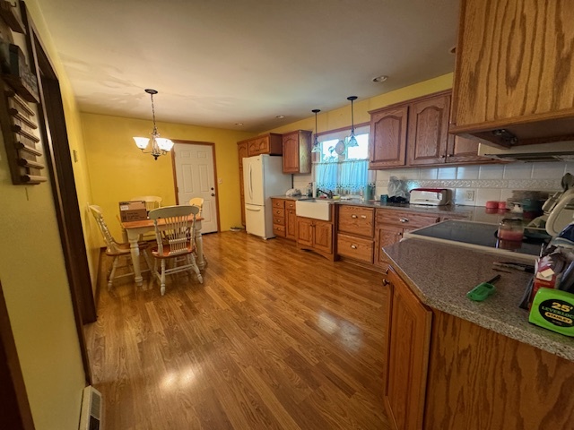 1518 Sharon Road Streator, IL 61364 - Photo 9 of 37 a kitchen with stainless steel appliances granite countertop sink stove refrigerator dining table and chairs