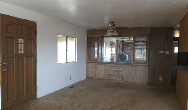 a large kitchen with a window