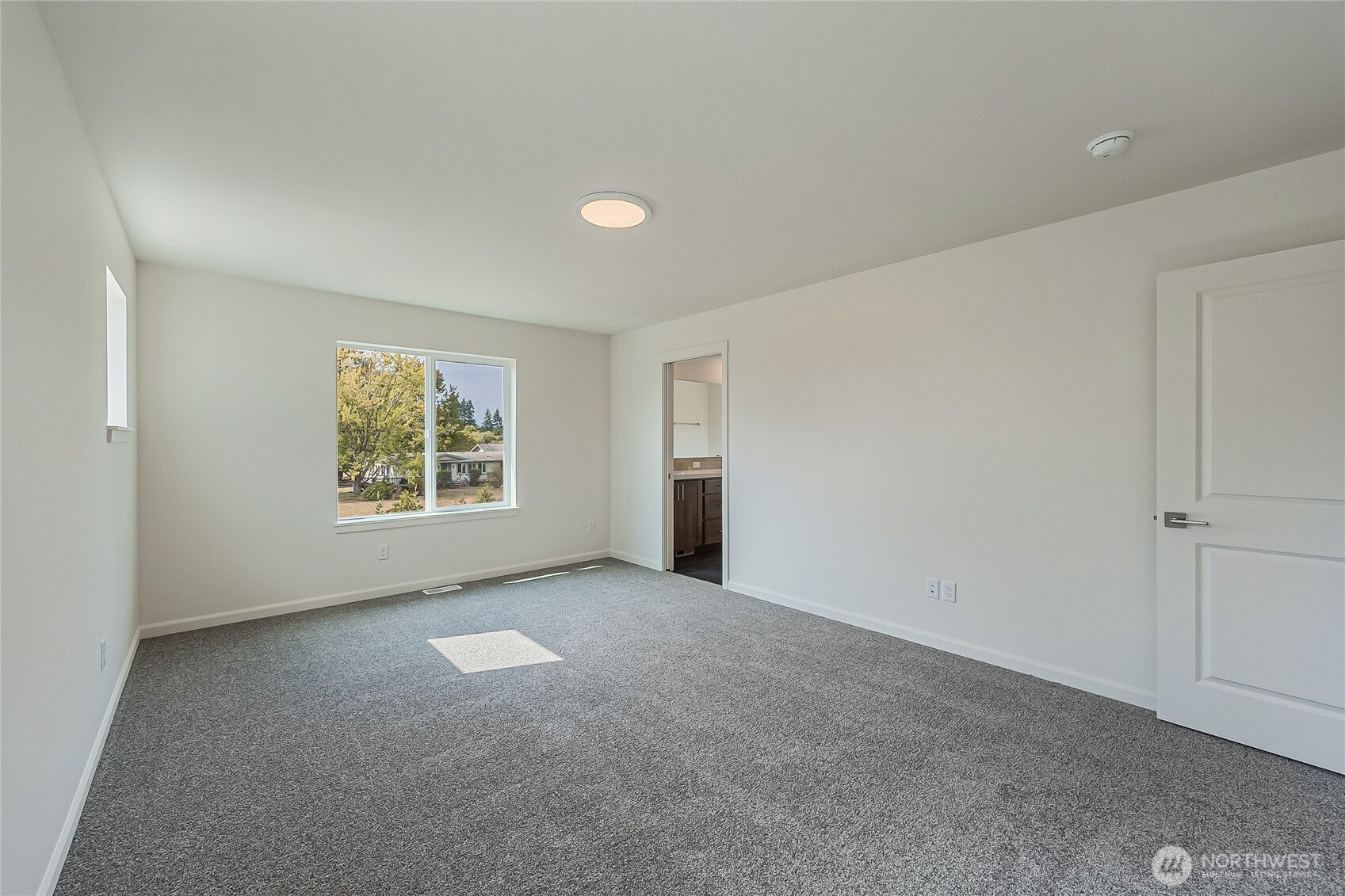 960 RW Fletcher Street Winlock, WA 98596 - Photo 19 of 40 an empty room with windows