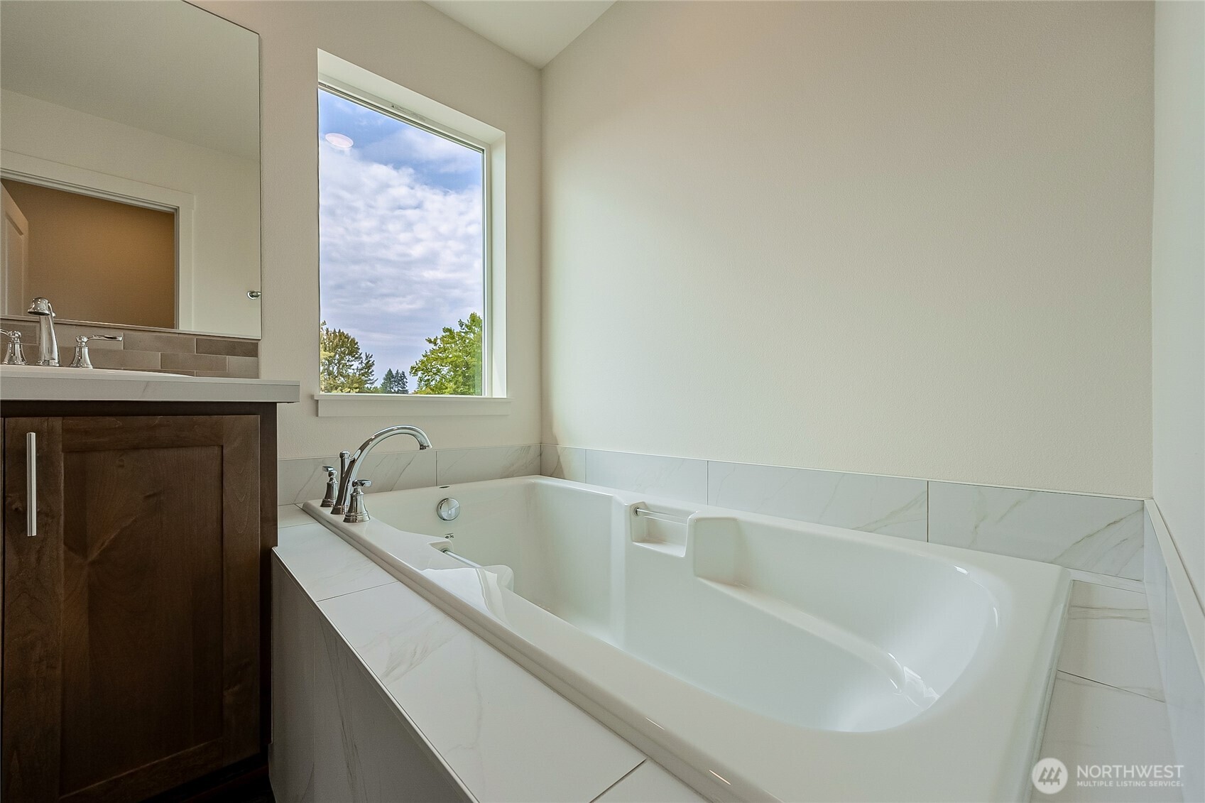 960 RW Fletcher Street Winlock, WA 98596 - Photo 22 of 40 a white bath tub sitting next to a white sink