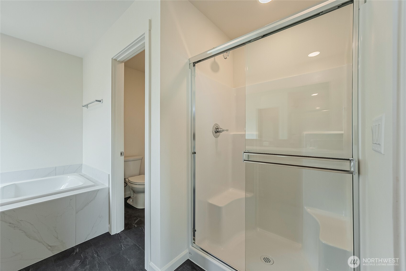 960 RW Fletcher Street Winlock, WA 98596 - Photo 23 of 40 a bathroom with a bathtub and a shower