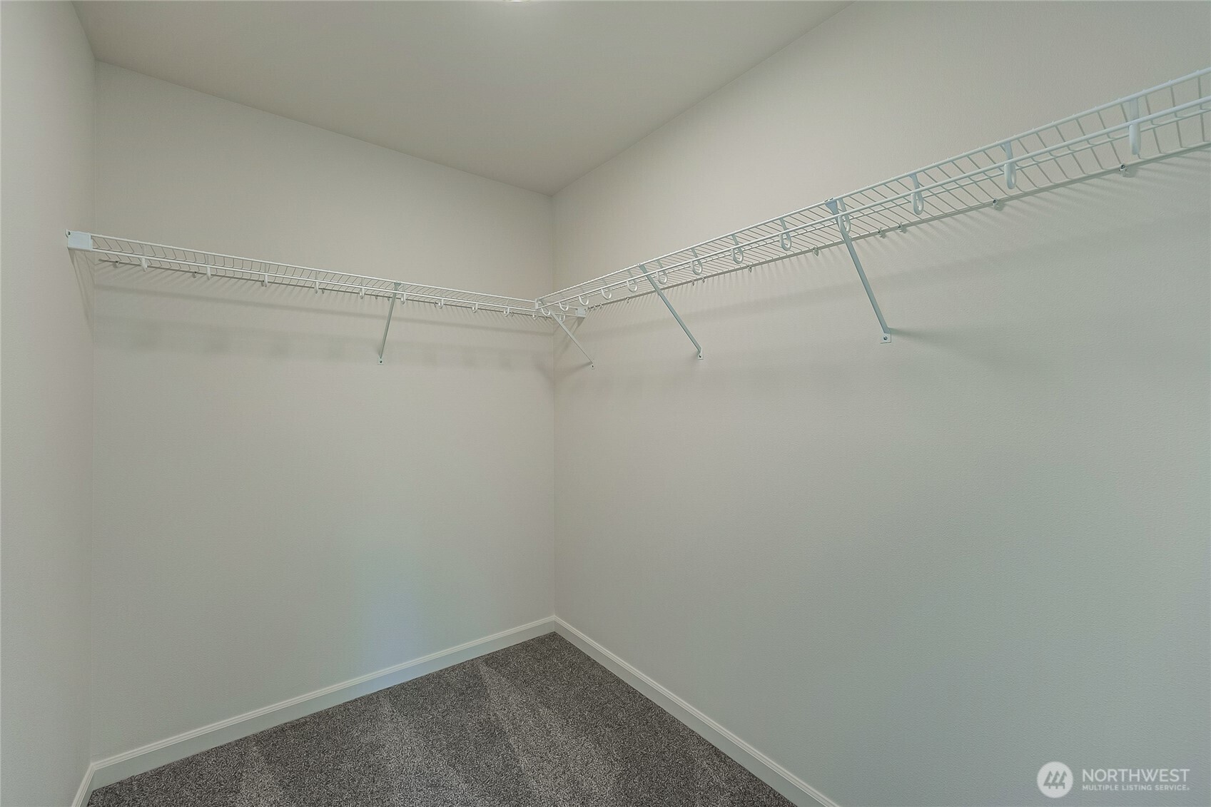 960 RW Fletcher Street Winlock, WA 98596 - Photo 24 of 40 a view of a room with racks on the wall