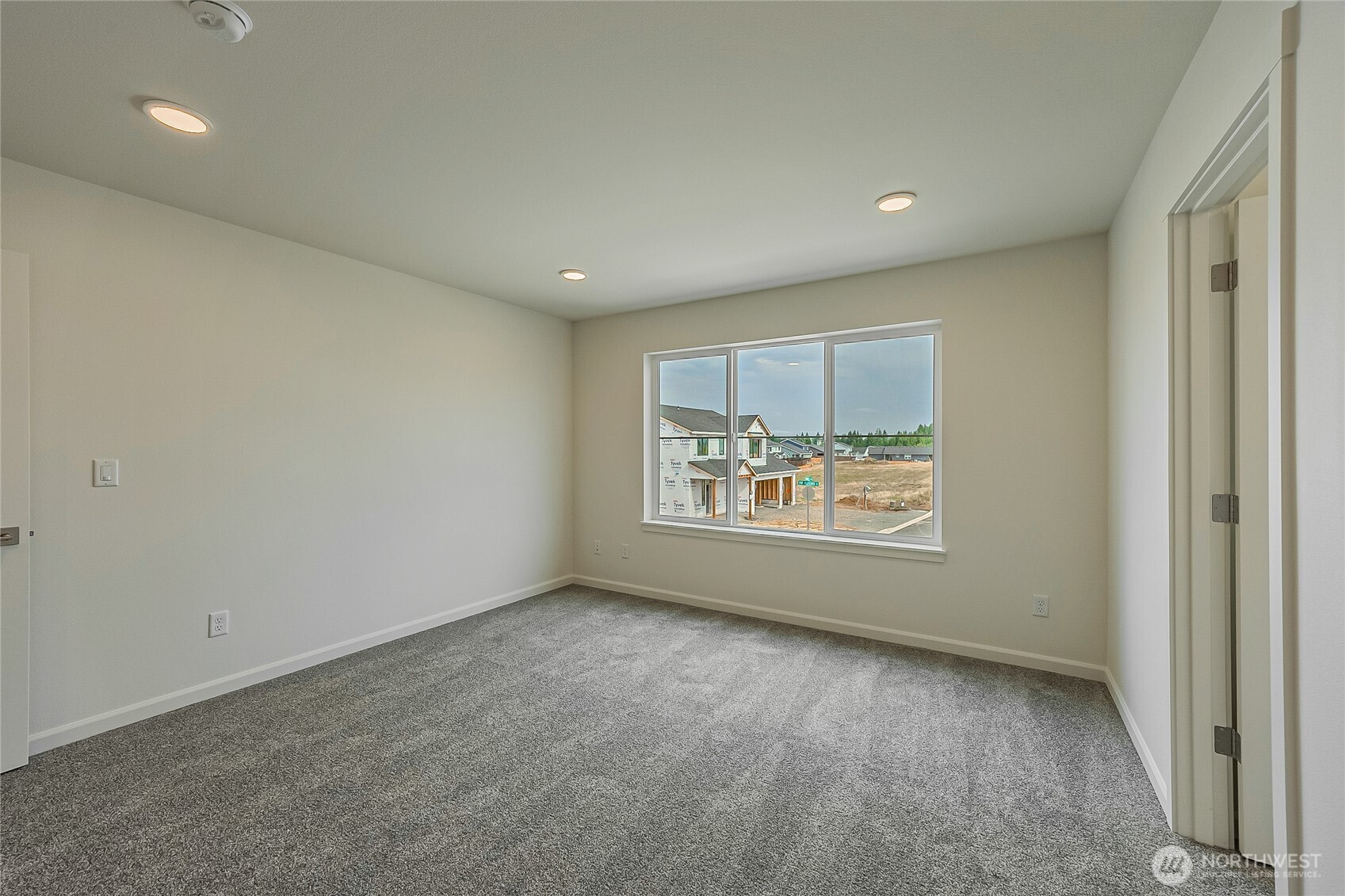 960 RW Fletcher Street Winlock, WA 98596 - Photo 27 of 40 a view of room with window and wooden floor